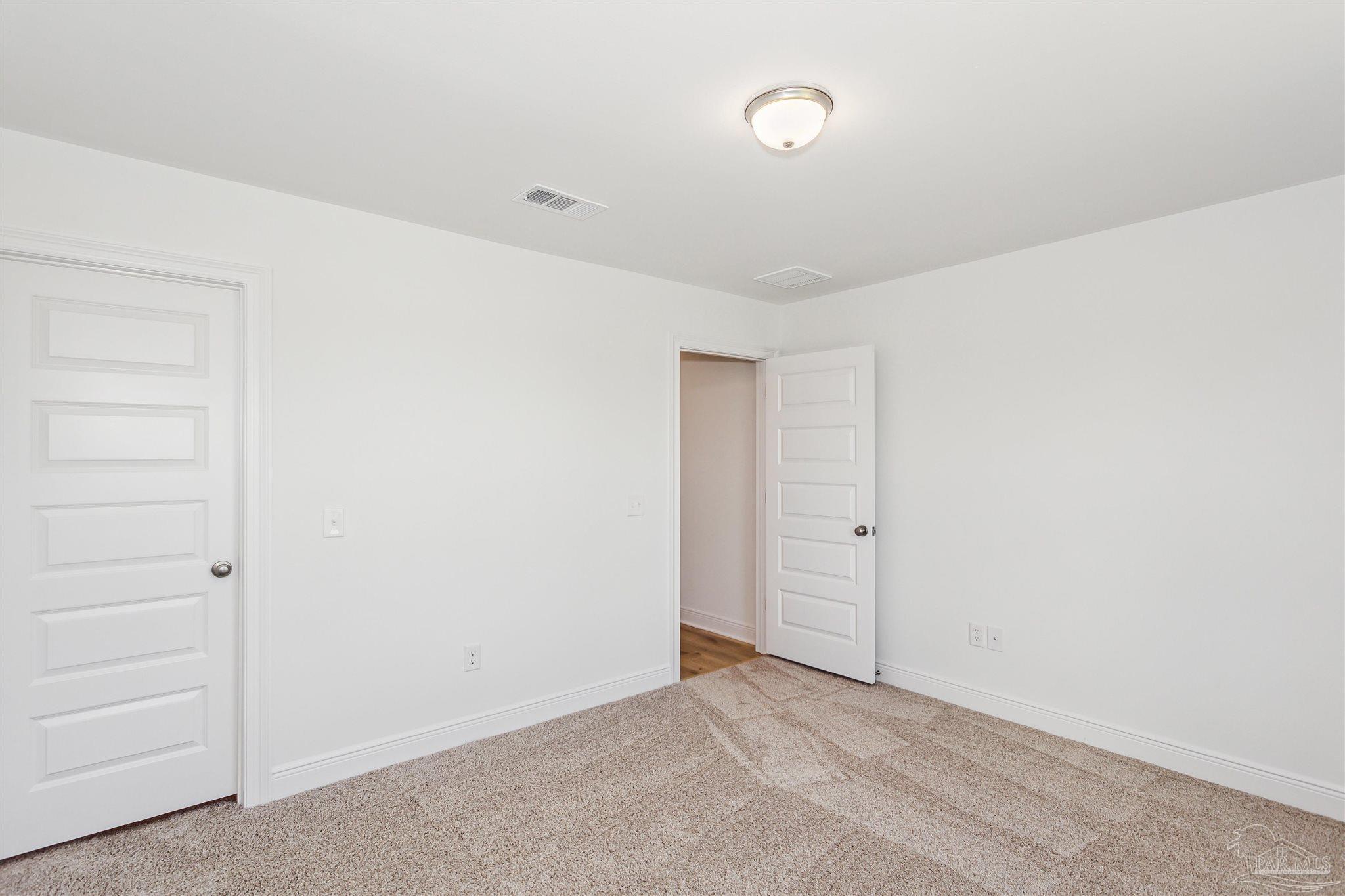 9319 Salter Road Pace, FL 32571 - Photo 18 of 32 a view of an empty room