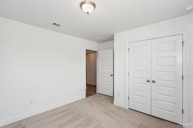 an empty room with closet