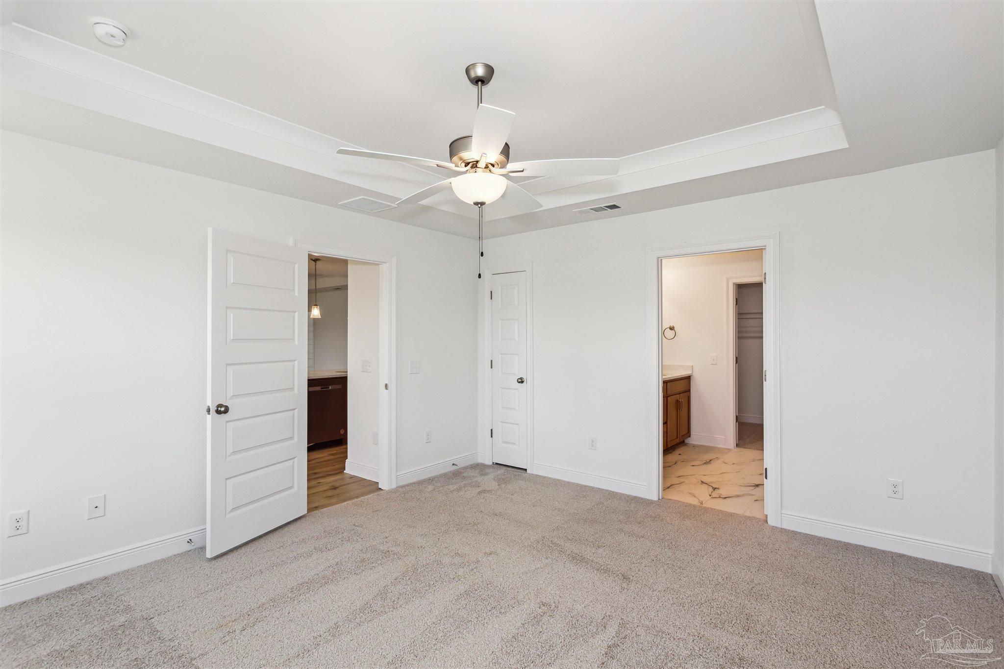 9319 Salter Road Pace, FL 32571 - Photo 24 of 32 an empty room with closet and a ceiling fan