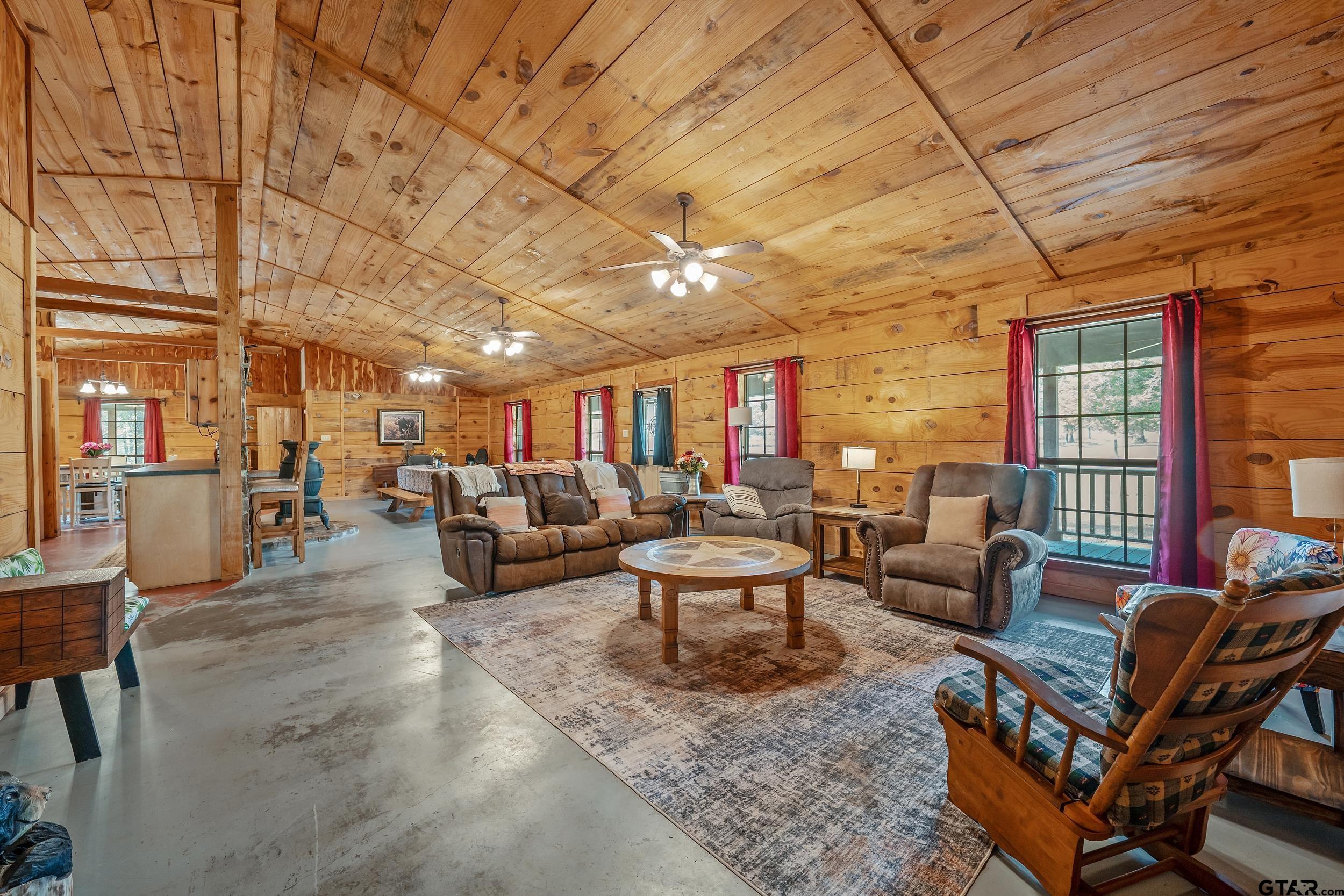 20304 State Highway 155 Winona, TX 75792 - Photo 22 of 48 a living room with furniture and a outdoor space