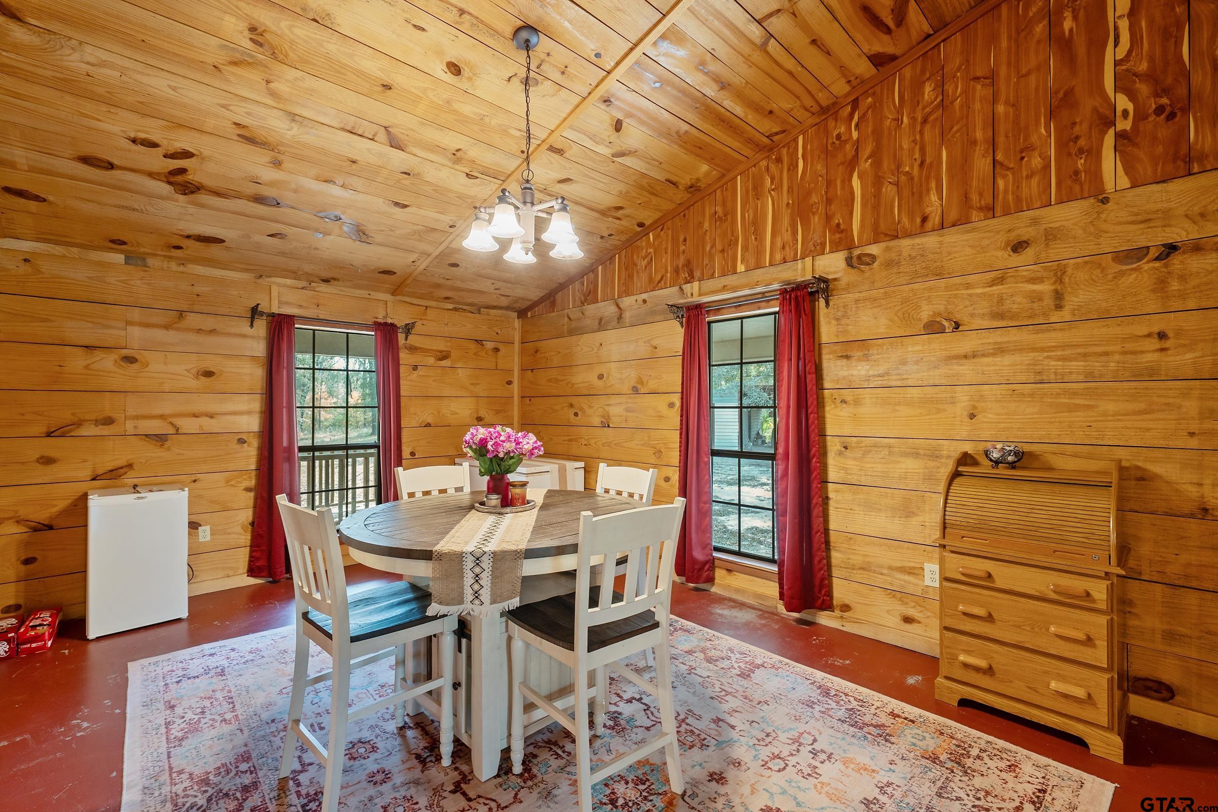 20304 State Highway 155 Winona, TX 75792 - Photo 25 of 48 a dining room with furniture and wooden floor