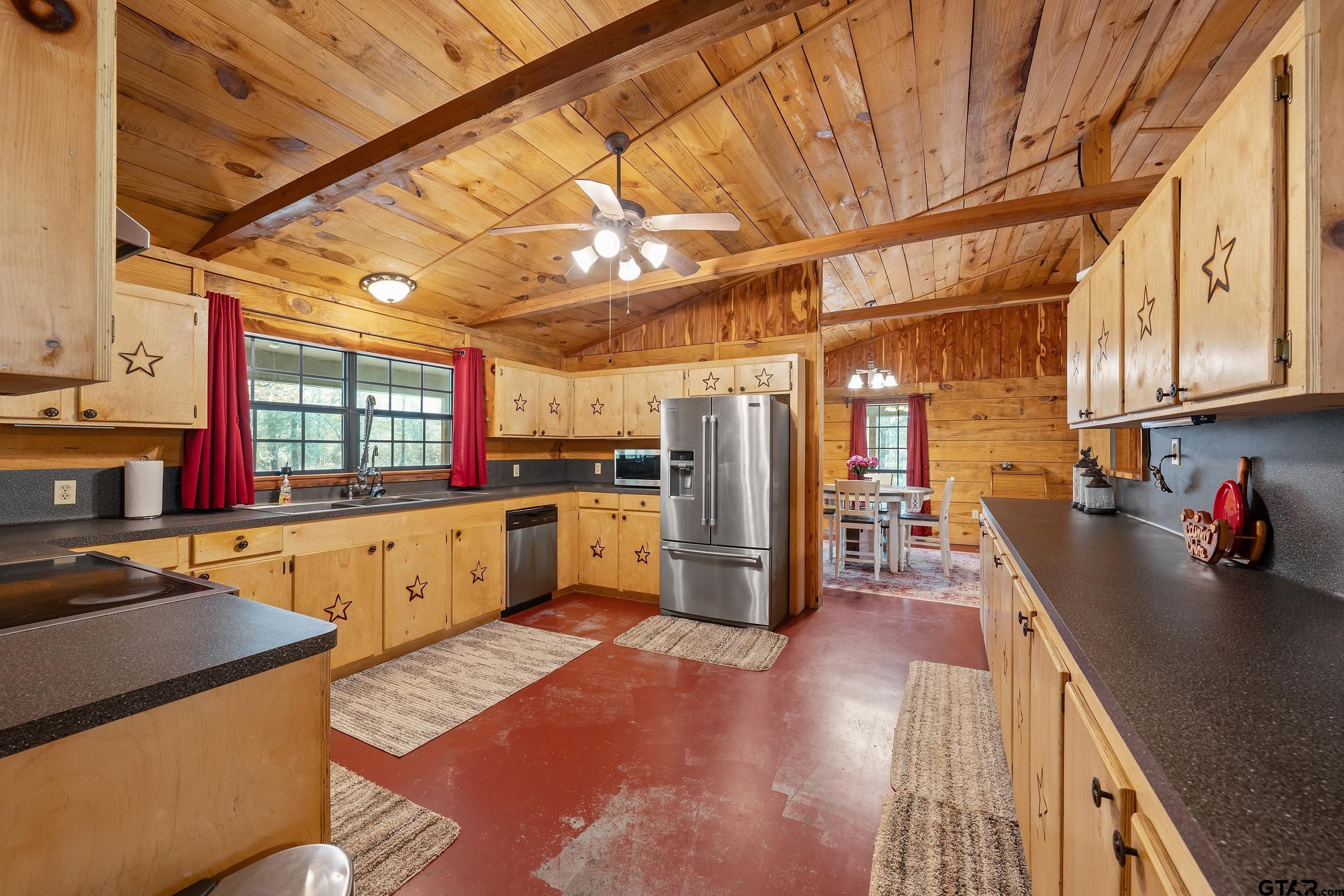 20304 State Highway 155 Winona, TX 75792 - Photo 27 of 48 a kitchen with refrigerator and window