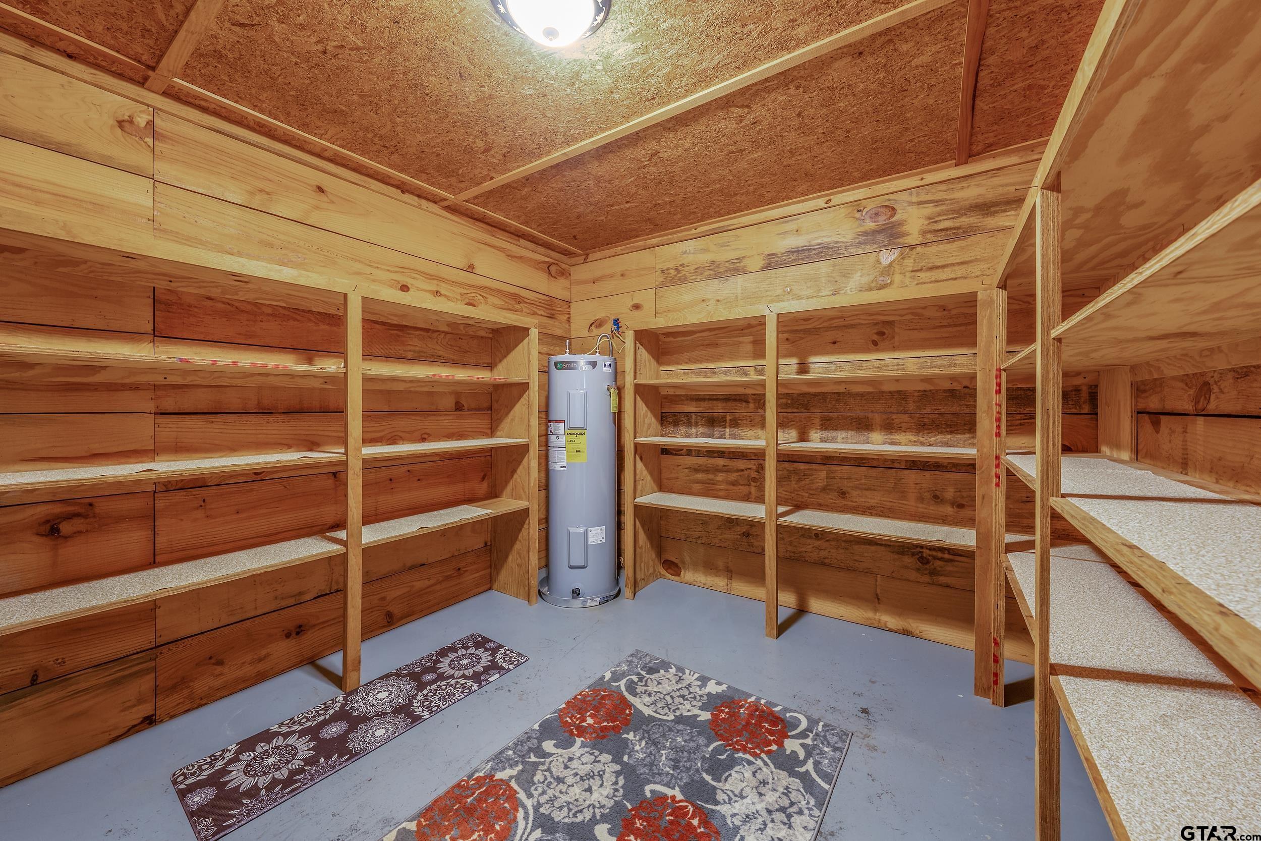 20304 State Highway 155 Winona, TX 75792 - Photo 29 of 48 a view of walk in closet with empty racks