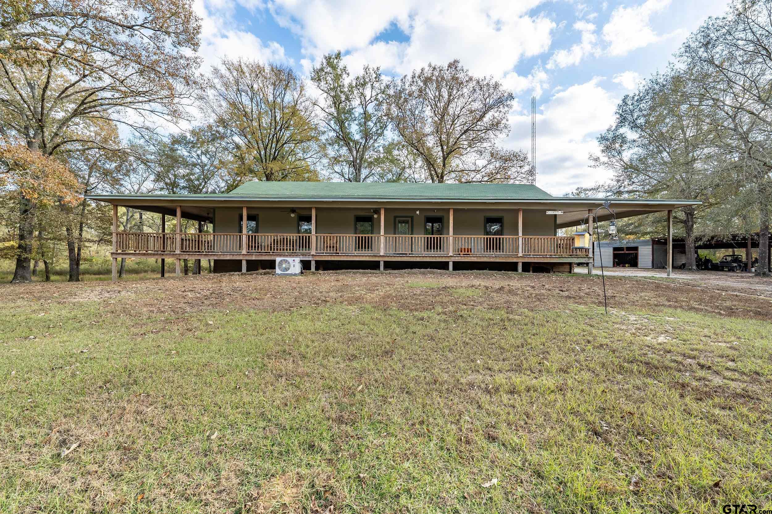 20304 State Highway 155 Winona, TX 75792 - Photo 3 of 48 front view of a house with a yard