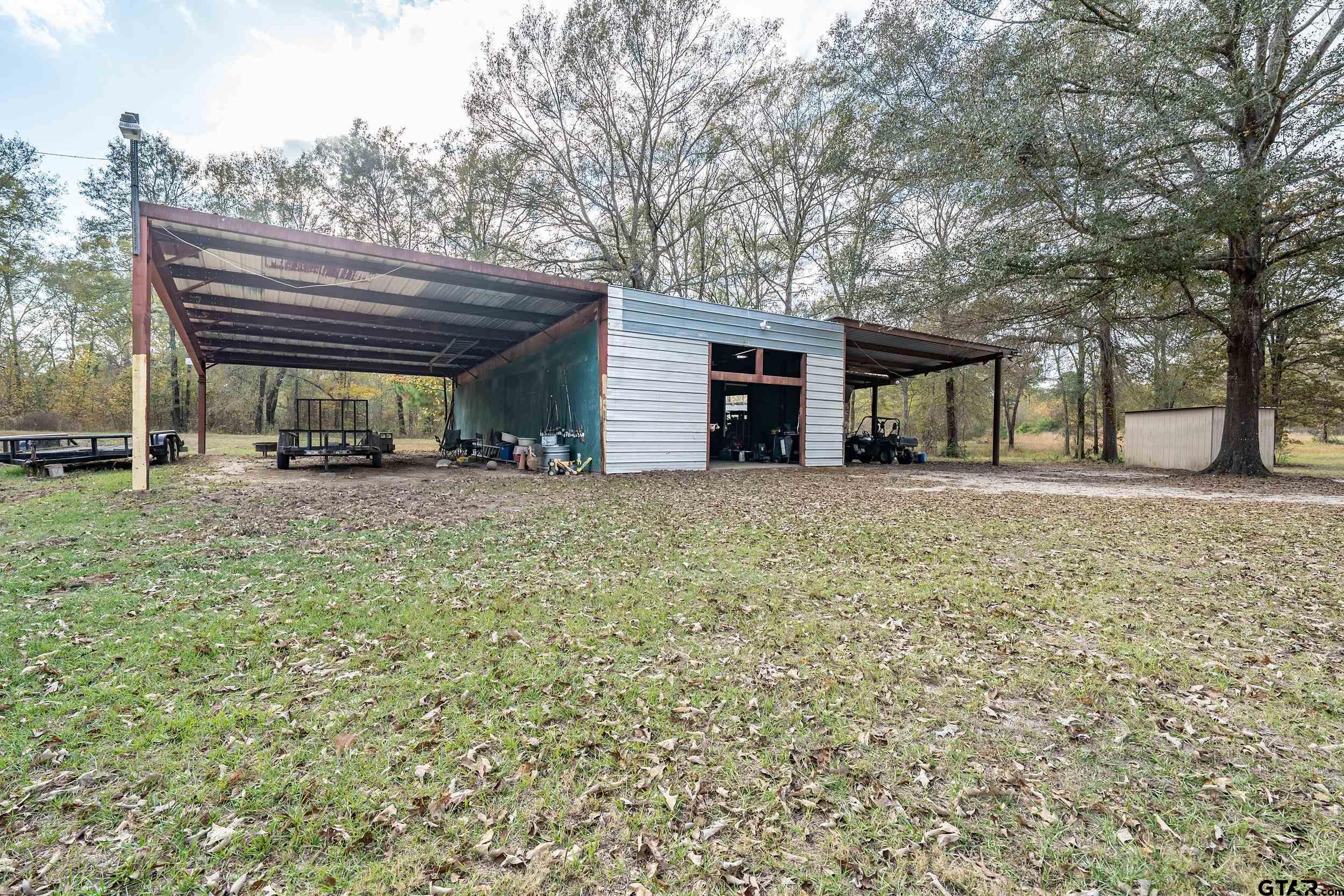 20304 State Highway 155 Winona, TX 75792 - Photo 41 of 48 a front view of a house with a yard