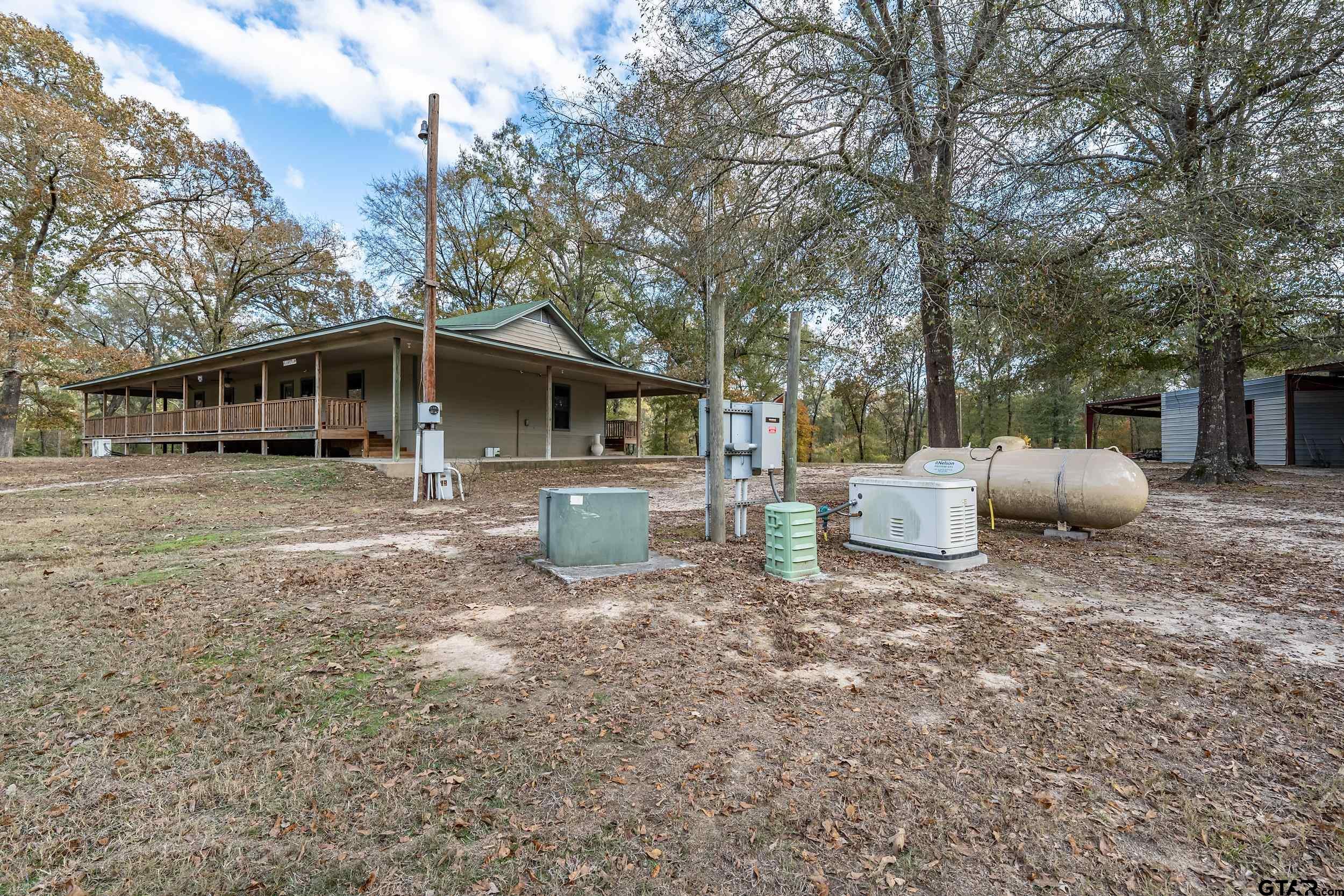 20304 State Highway 155 Winona, TX 75792 - Photo 42 of 48 a front view of a house with garden