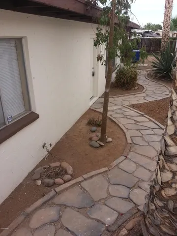 a vase of flowers sitting on a table