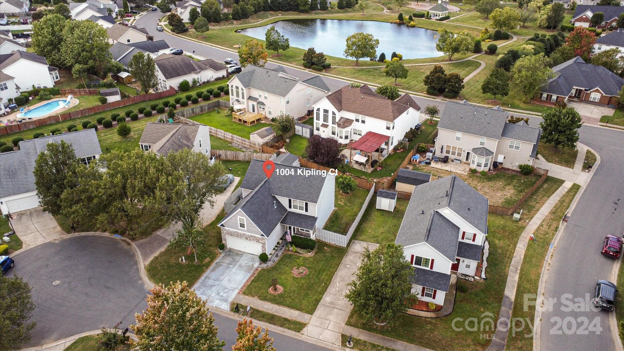 1004 Kipling Court Indian Trail, NC 28079 - Photo 42 of 42 an aerial view of a houses with yard