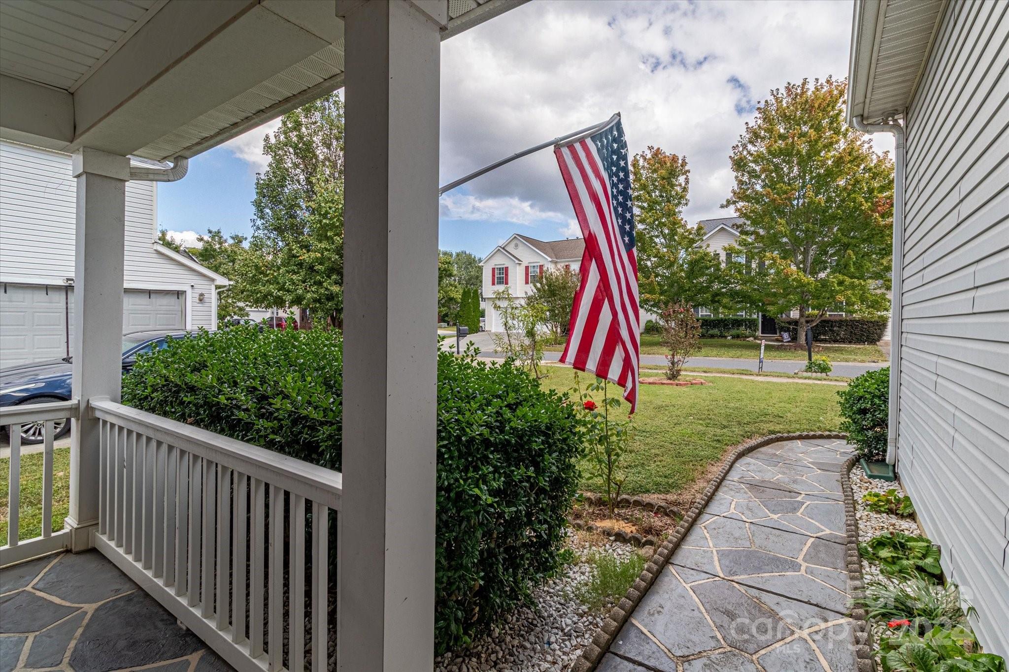 1004 Kipling Court Indian Trail, NC 28079 - Photo 7 of 42 a view of a backyard with a garden and plants