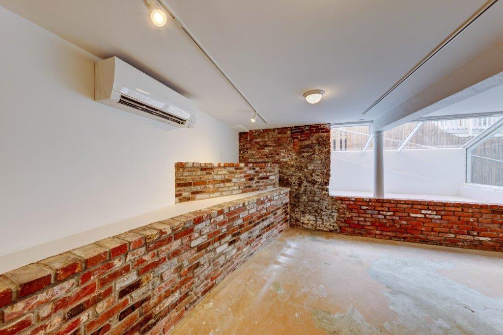 313 Main Street Wellfleet, MA 02667 - Photo 17 of 32 Lower Level Looking out Windows Side