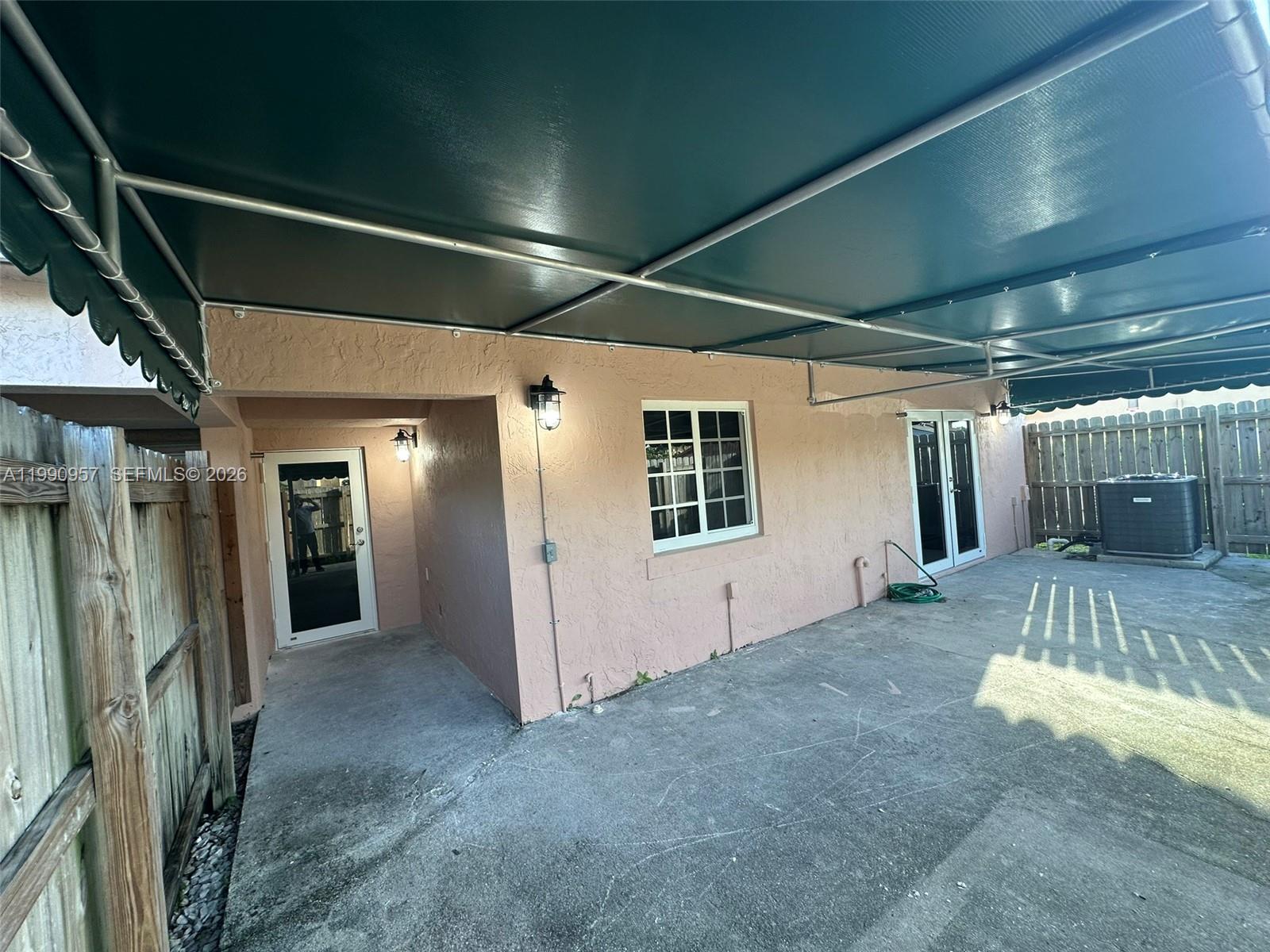 12005 Southwest 14th Street, Unit 403D Miami, FL 33184 - Photo 26 of 26 a view of a porch of the house