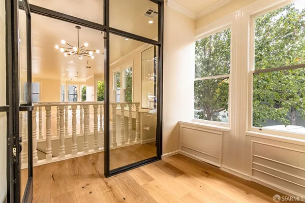 a view of an empty room and window