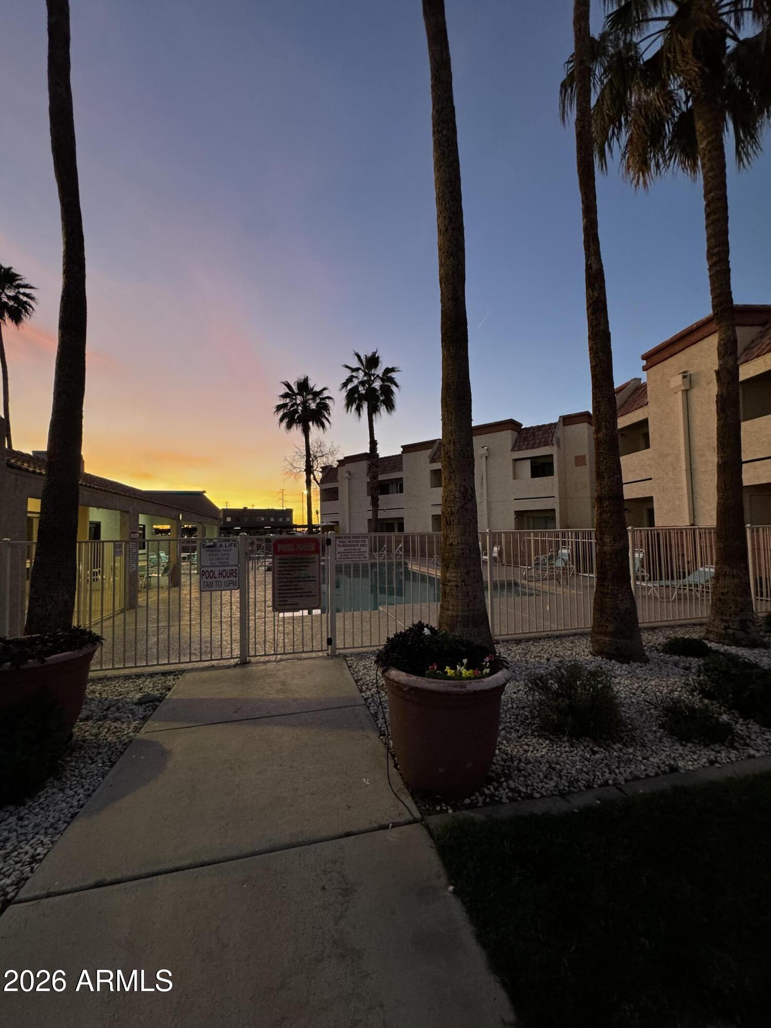 12123 West Bell Road, Unit 258 Surprise, AZ 85378 - Photo 21 of 30 a view of a house with a porch