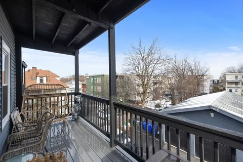 a view of city from a balcony