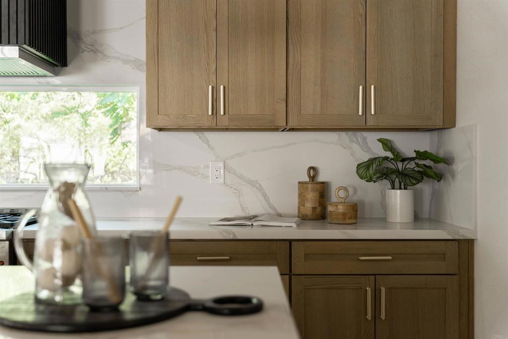 2275 Ivy Road Oceanside, CA 92054 - Photo 15 of 45 a closeup of a sink with wooden floor