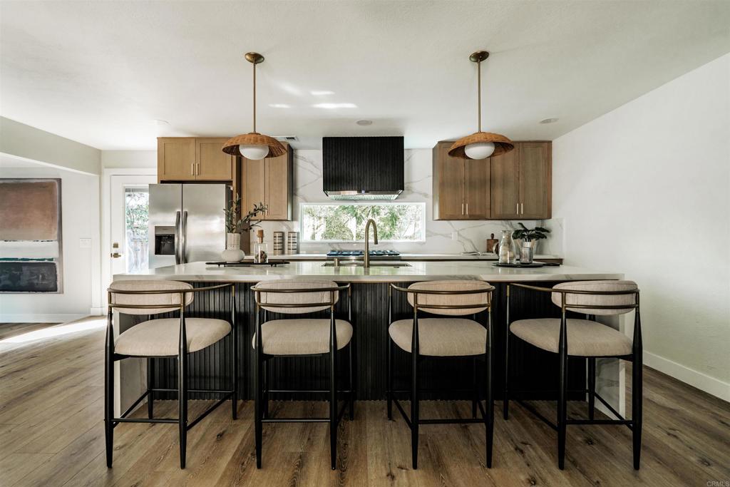 2275 Ivy Road Oceanside, CA 92054 - Photo 18 of 45 a dining room with furniture and window