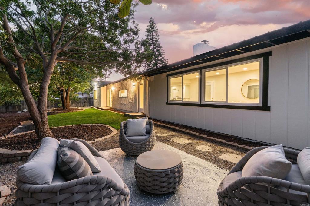 2275 Ivy Road Oceanside, CA 92054 - Photo 3 of 45 a outdoor living space with furniture and a garden