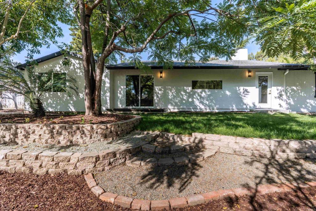 2275 Ivy Road Oceanside, CA 92054 - Photo 41 of 45 a front view of a house with garden