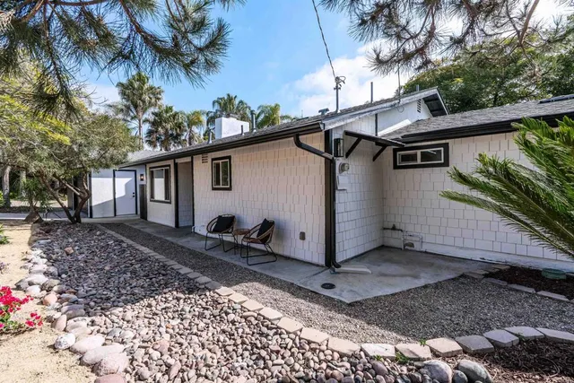 a view of a house with a patio
