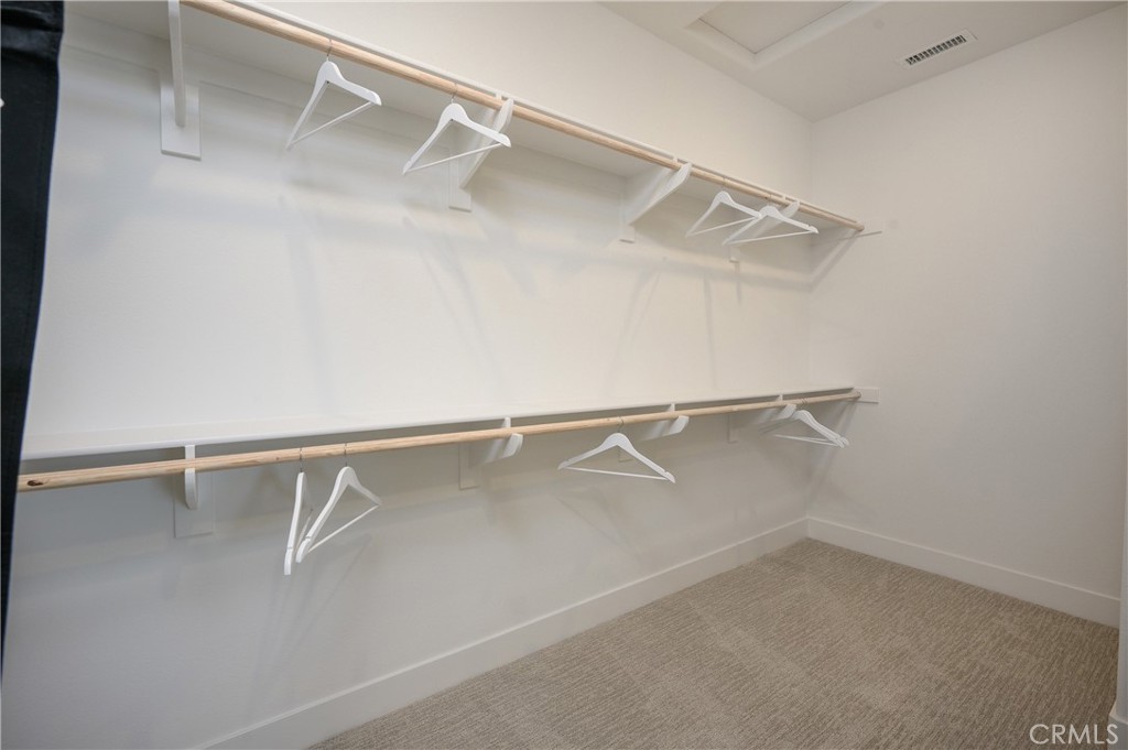 13093 Edgware Drive Rancho Cucamonga, CA 91739 - Photo 17 of 25 a view of an empty walk in closet
