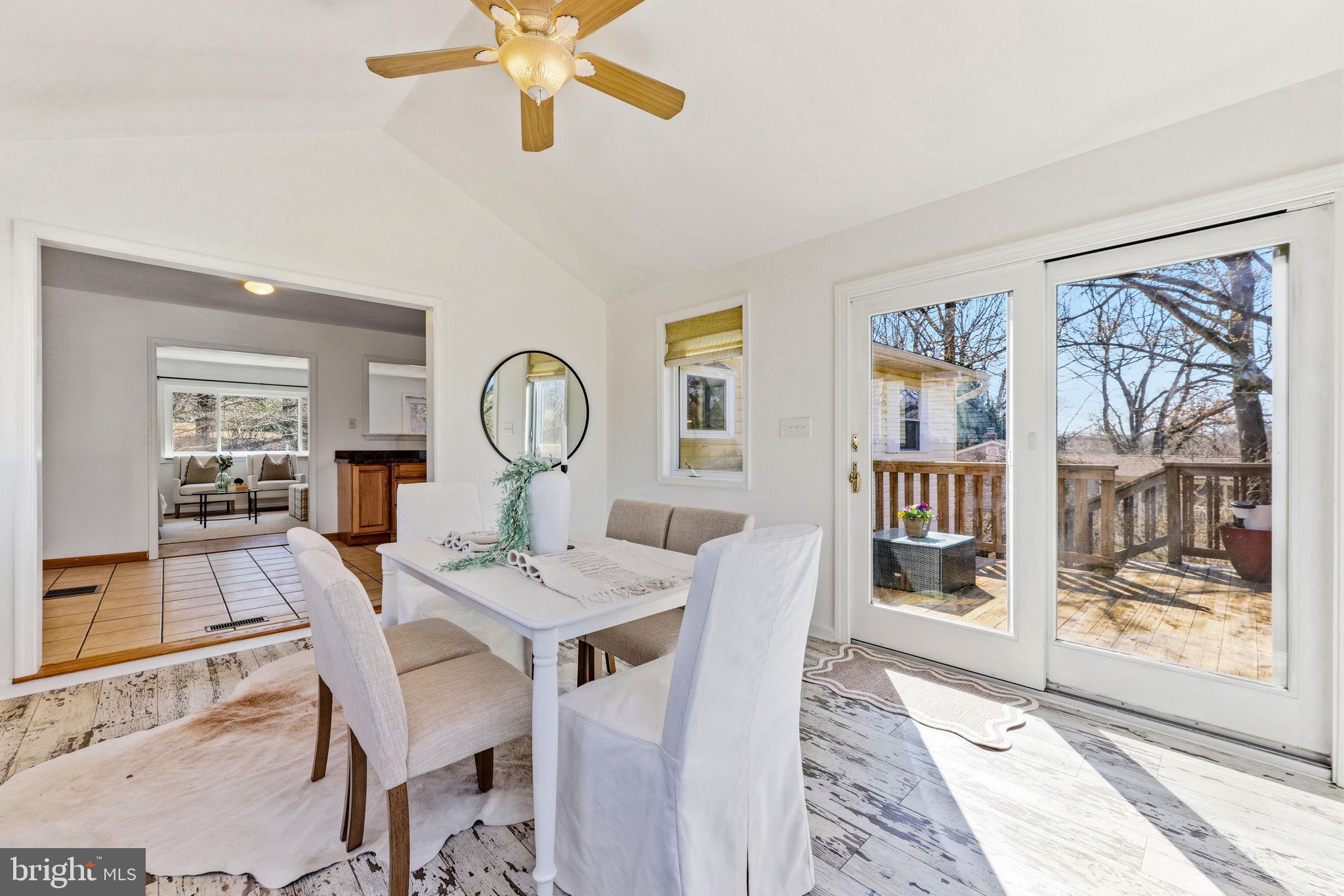 612 Ridge Road Finksburg, MD 21048 - Photo 19 of 39 a view of a dining room with furniture window and wooden floor