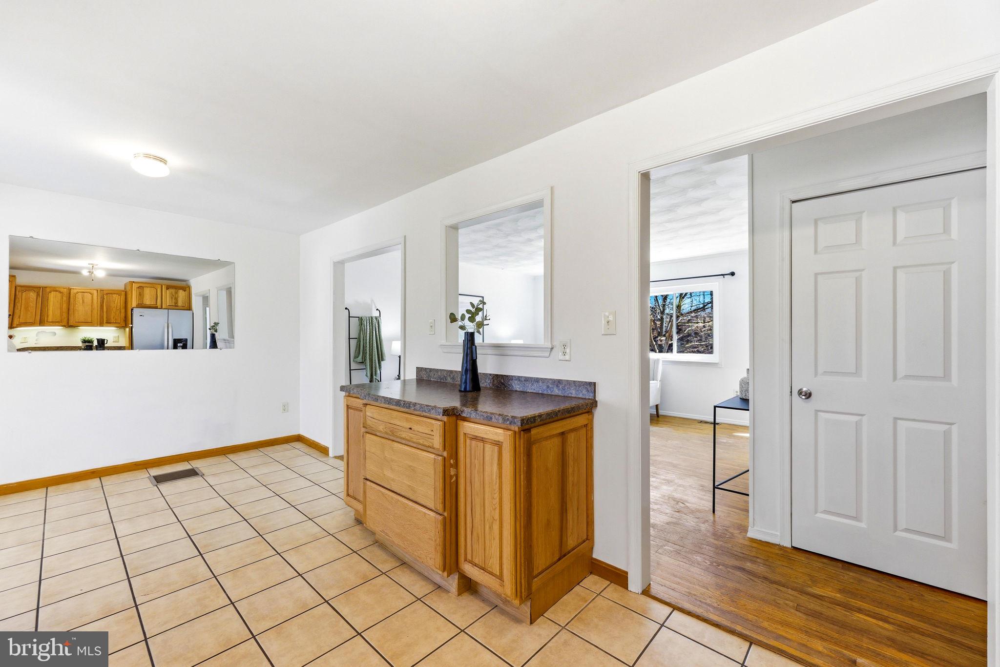 612 Ridge Road Finksburg, MD 21048 - Photo 25 of 39 a view of a kitchen from the hallway