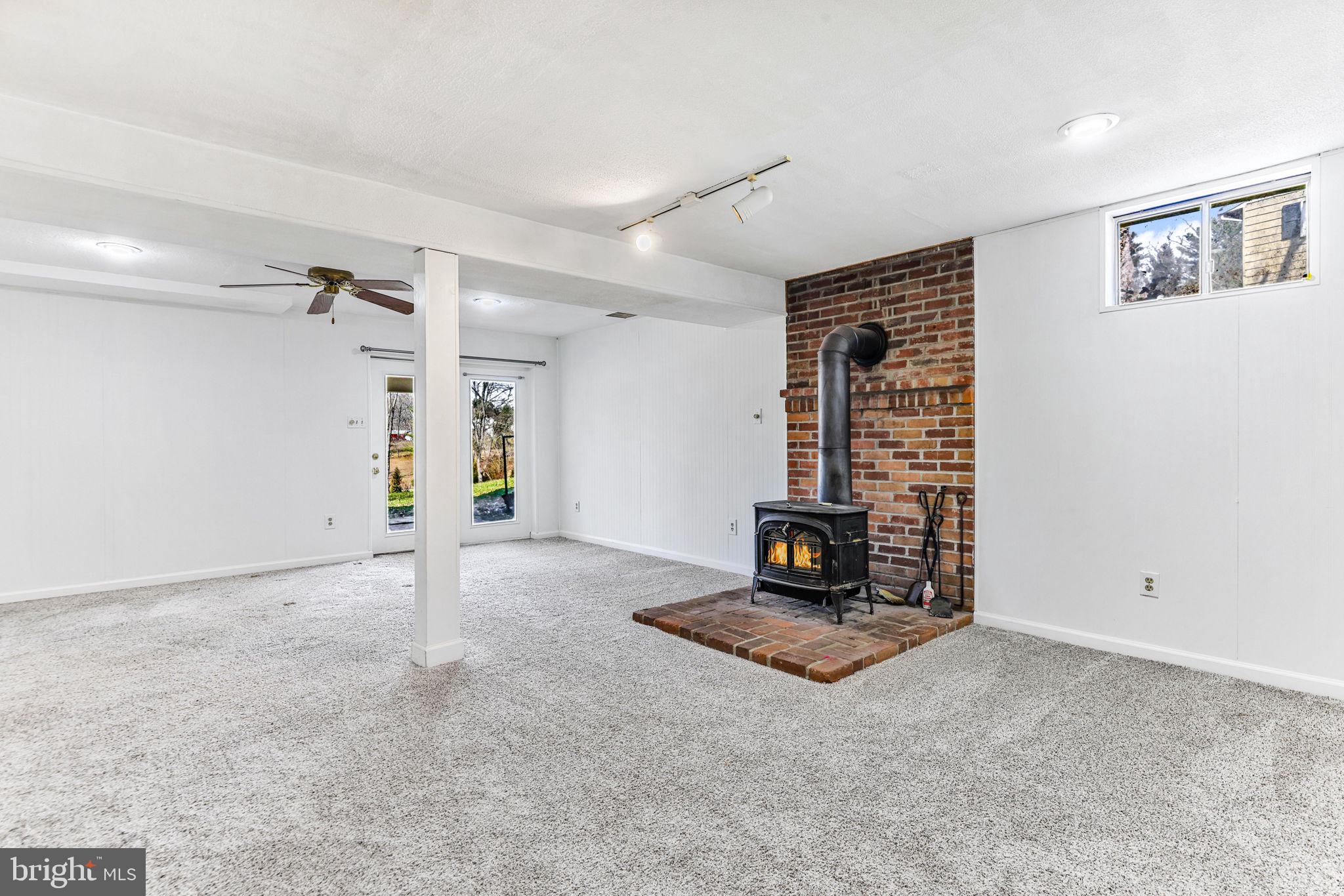 612 Ridge Road Finksburg, MD 21048 - Photo 35 of 39 a living room with a fireplace
