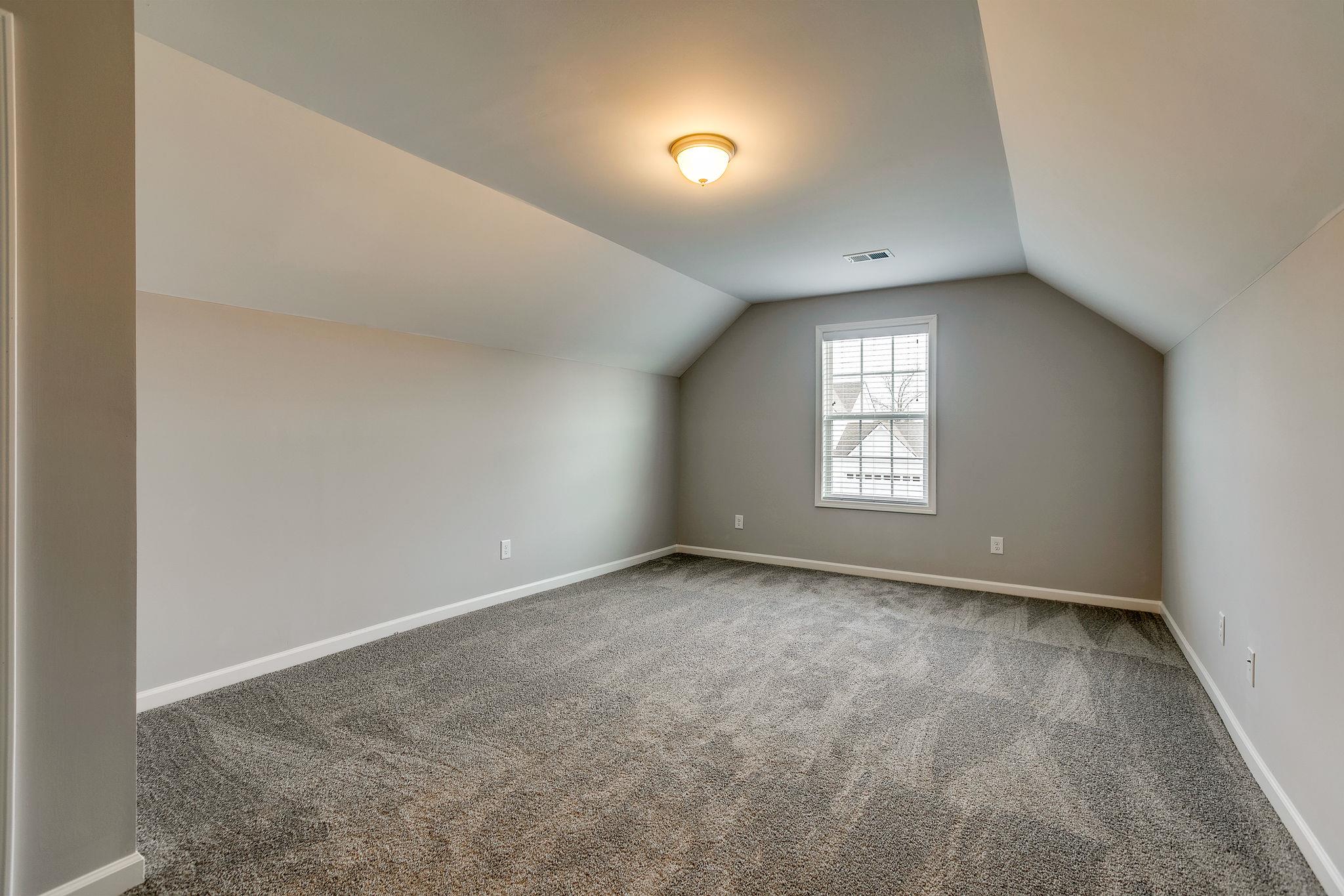 709 Mitscher Drive Spring Hill, TN 37174 - Photo 20 of 27 an empty room with a window