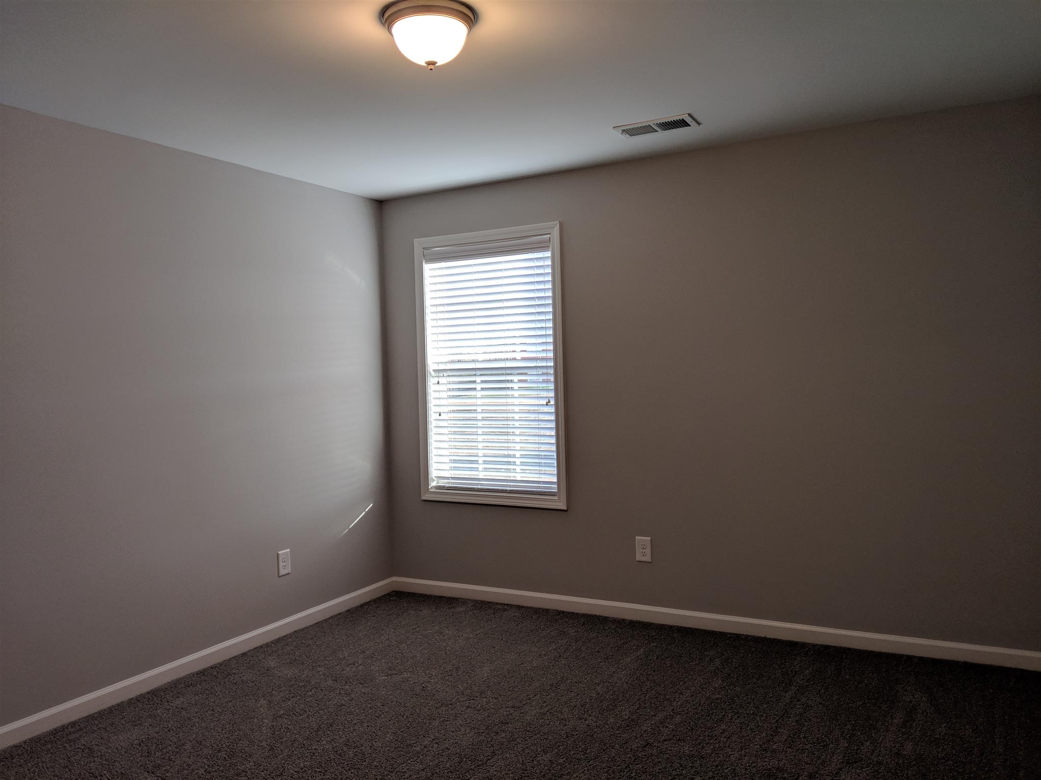 709 Mitscher Drive Spring Hill, TN 37174 - Photo 24 of 27 an empty room with a window