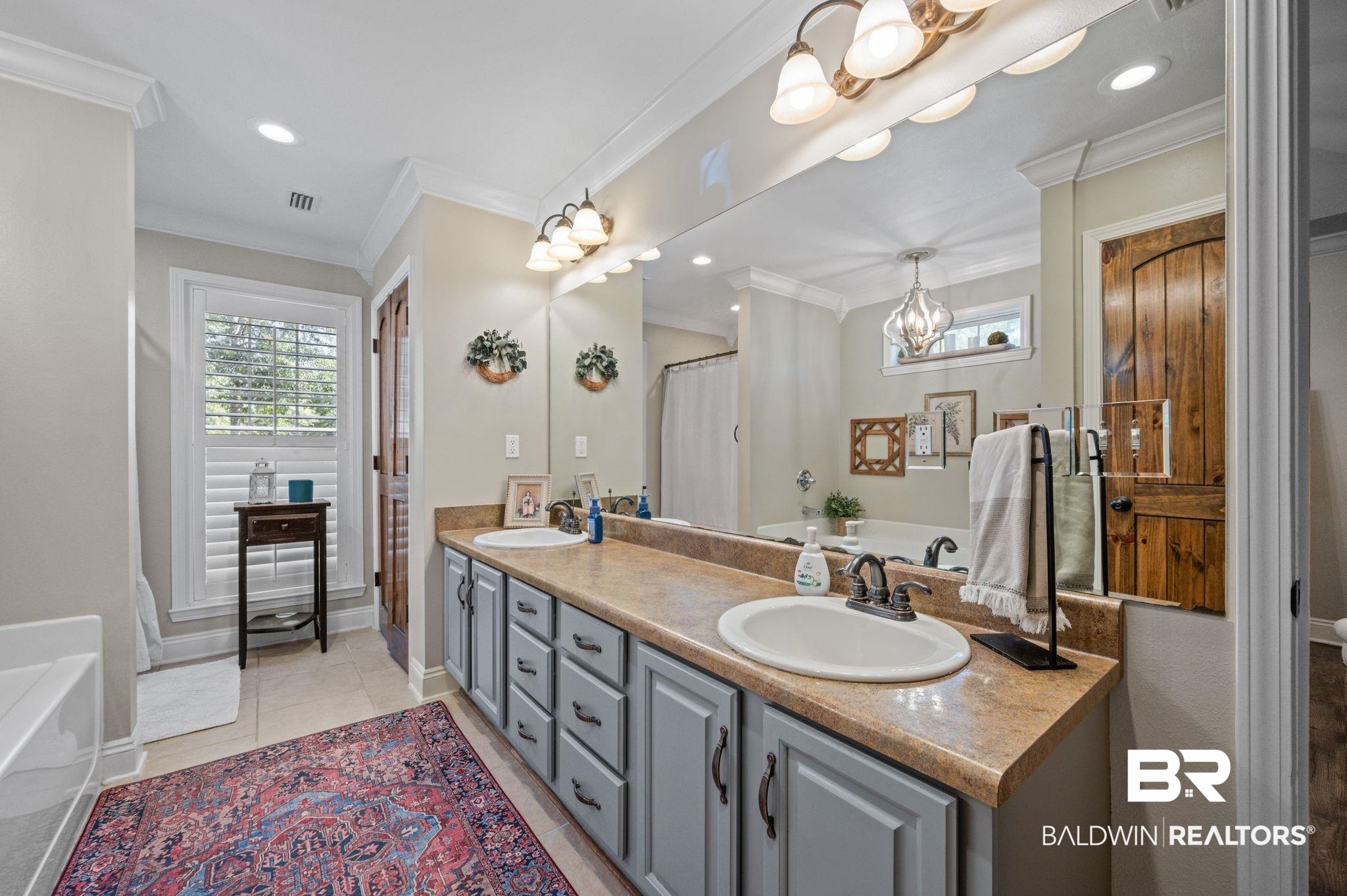 38211-d) V R Byrd Road Bay Minette, AL 36507 - Photo 19 of 58 Bathroom with tile patterned flooring, vanity, and ornamental molding