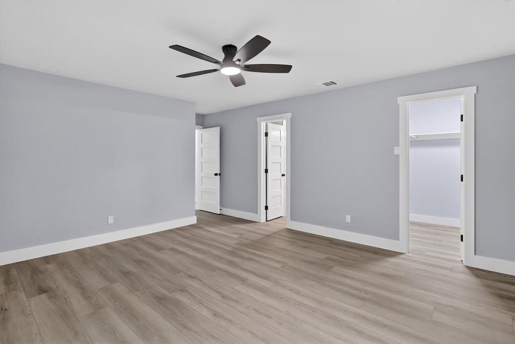 2005 Chestnut Road Carrollton, TX 75007 - Photo 26 of 35 a view of room with wooden floor and entryway