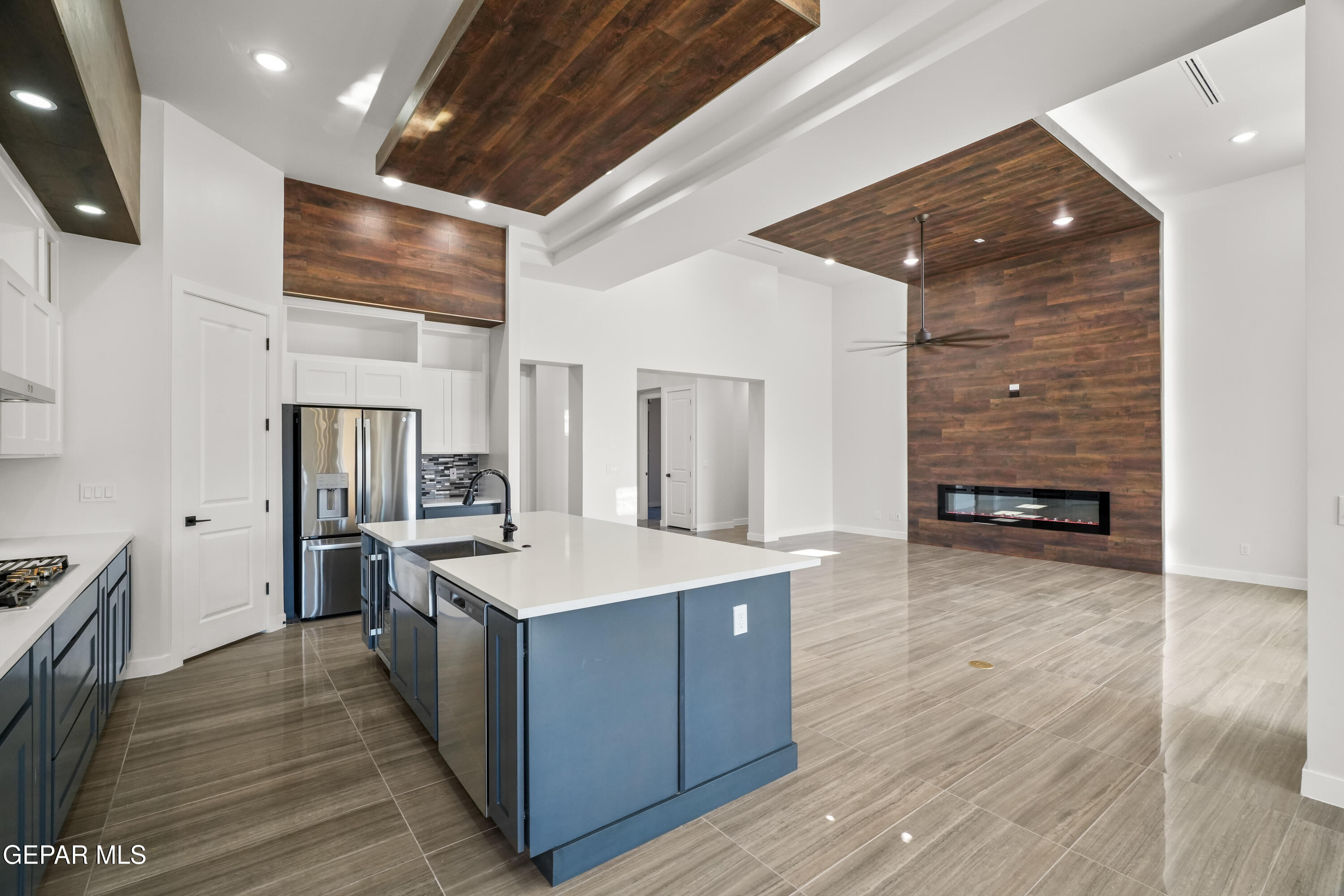360 Rio De Jazmin Circle El Paso, TX 79932 - Photo 16 of 66 a large kitchen with stainless steel appliances kitchen island granite countertop a stove and a refrigerator