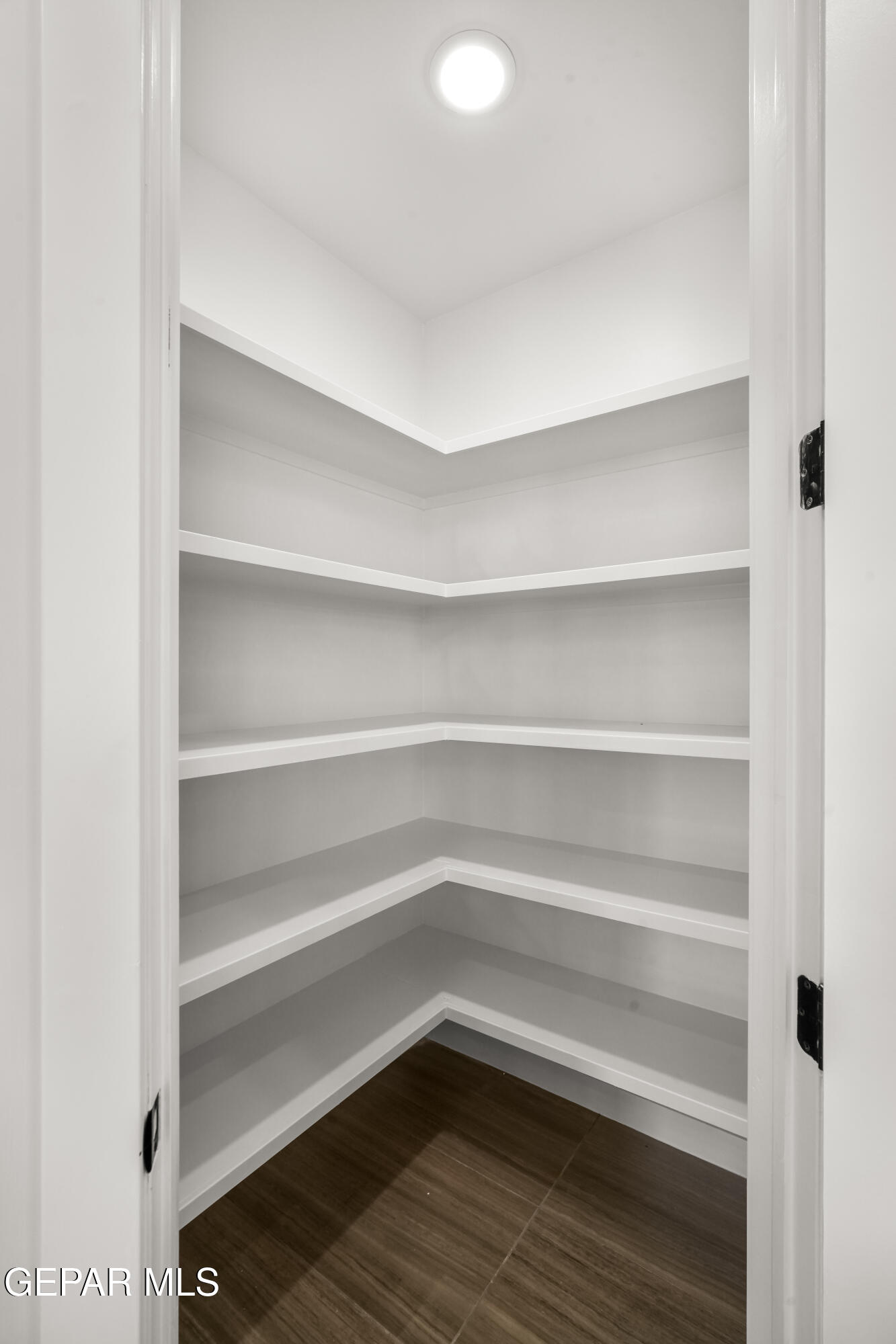 360 Rio De Jazmin Circle El Paso, TX 79932 - Photo 22 of 66 a storage room with wooden floor