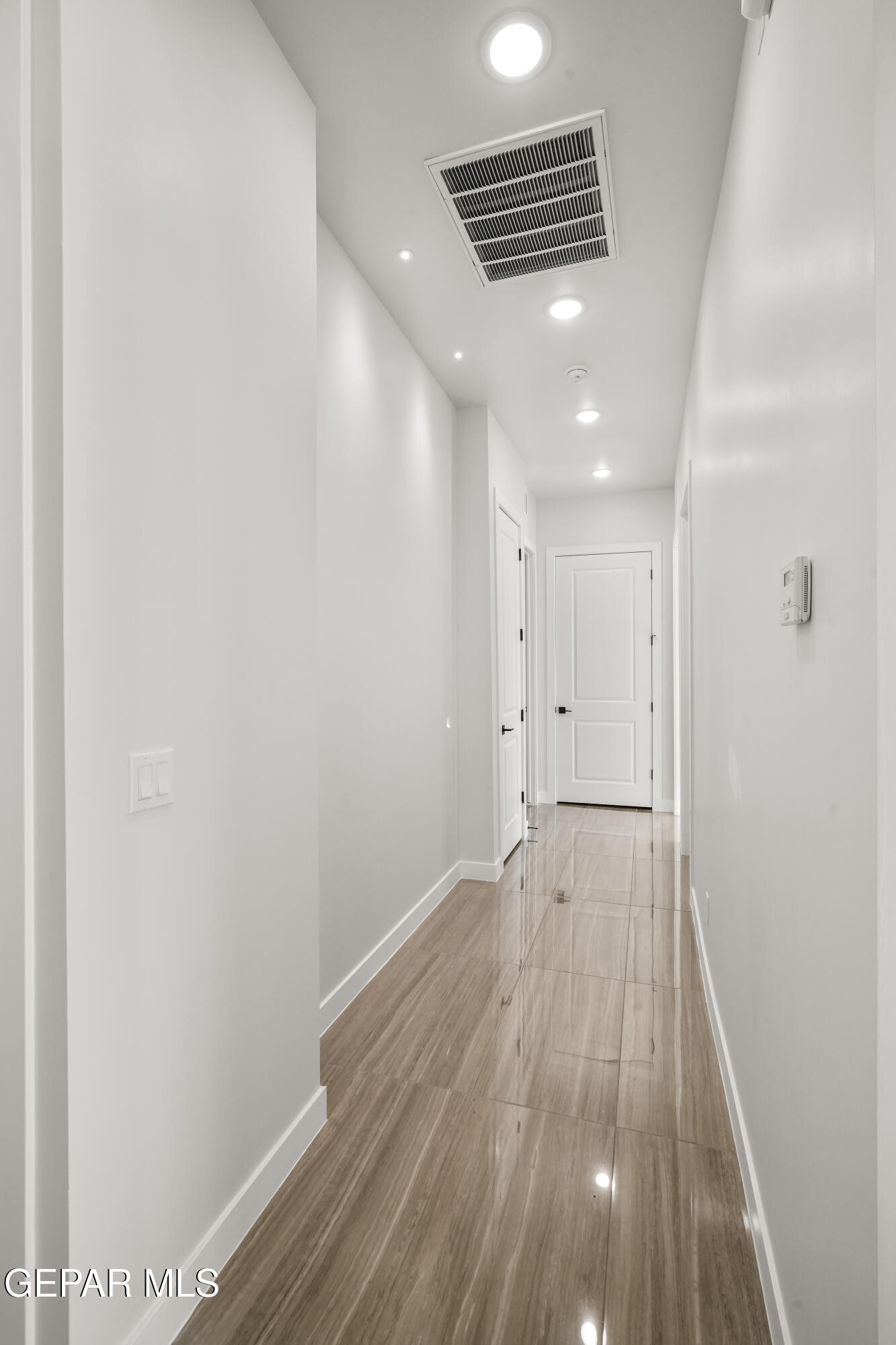 360 Rio De Jazmin Circle El Paso, TX 79932 - Photo 24 of 66 a view of hallway with wooden floor