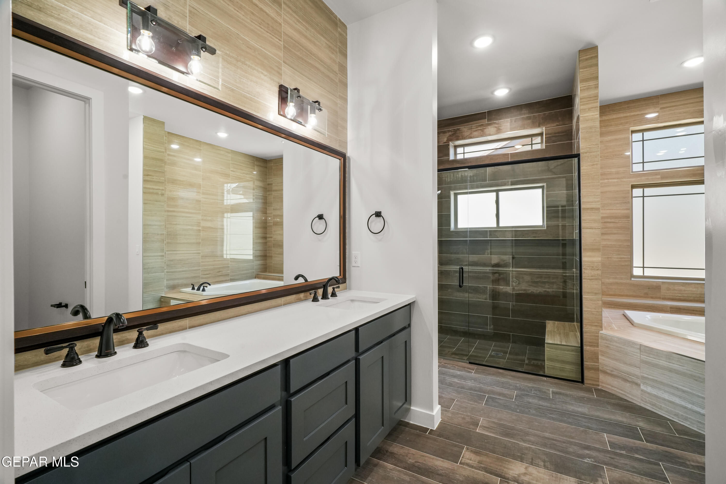 360 Rio De Jazmin Circle El Paso, TX 79932 - Photo 37 of 66 a bathroom with a sink double vanity and a mirror