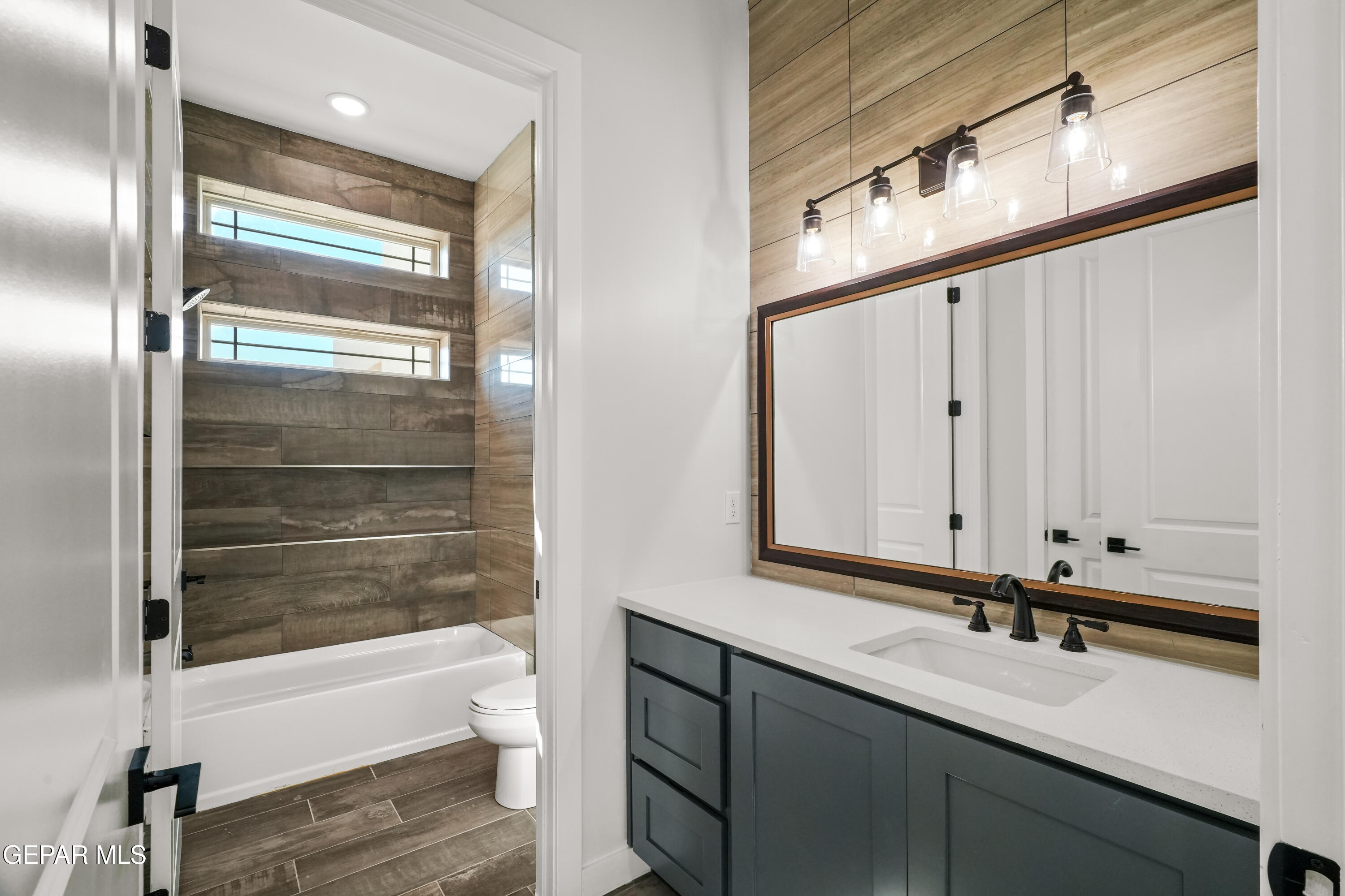 360 Rio De Jazmin Circle El Paso, TX 79932 - Photo 41 of 66 a bathroom with a bathtub and a shower