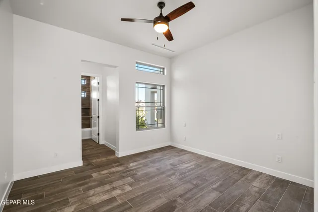 a view of hall way with furniture