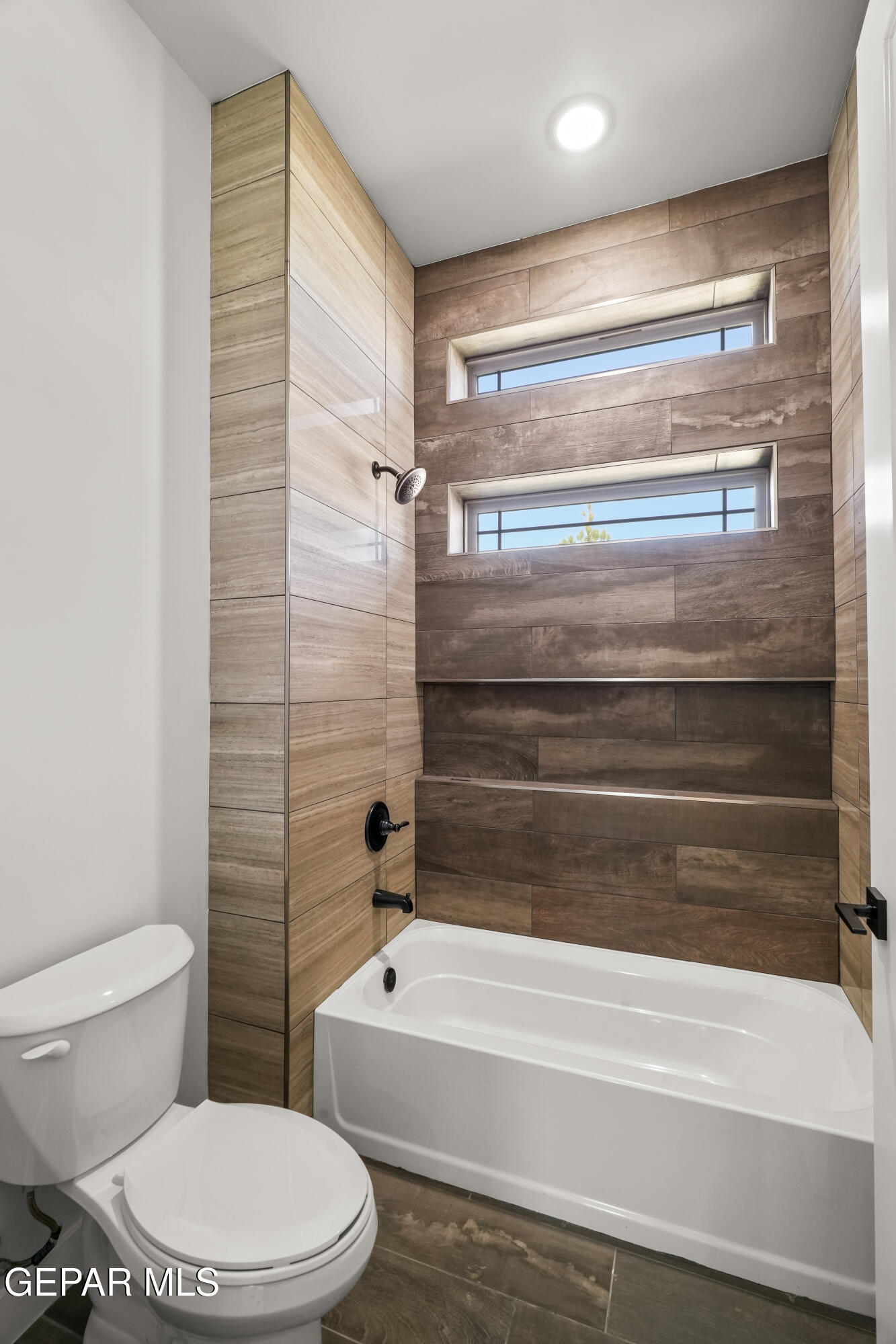 360 Rio De Jazmin Circle El Paso, TX 79932 - Photo 49 of 66 a bathroom with a toilet and a bathtub