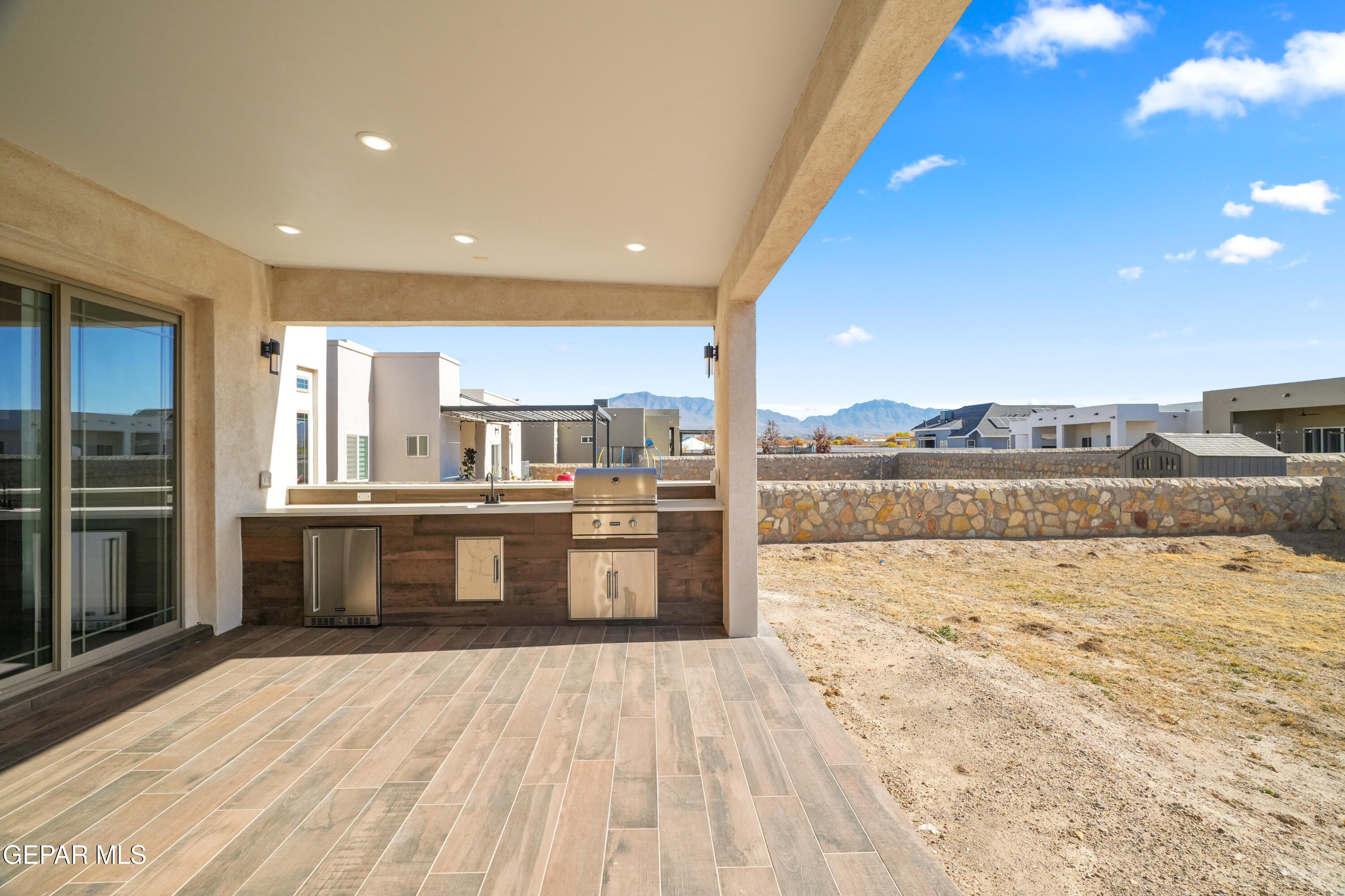 360 Rio De Jazmin Circle El Paso, TX 79932 - Photo 51 of 66 a large white kitchen with a large window and kitchen view