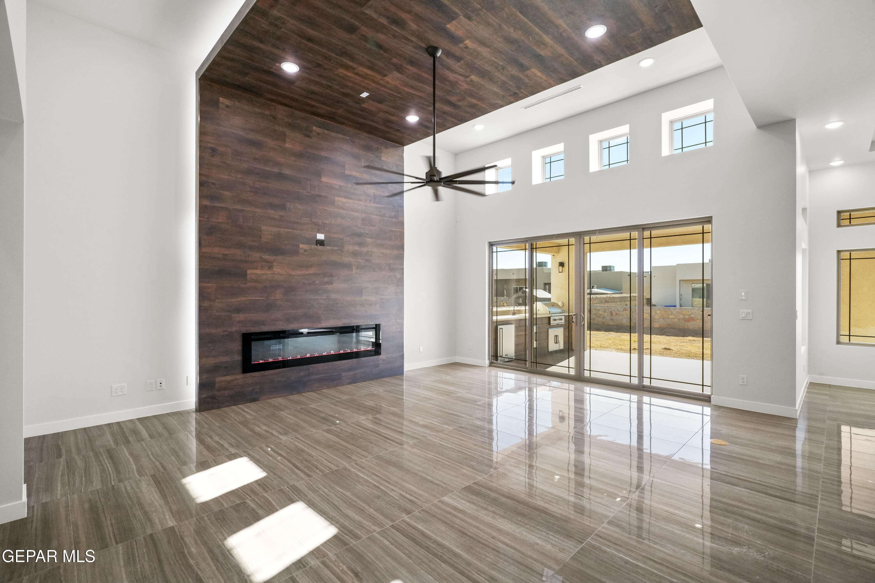 360 Rio De Jazmin Circle El Paso, TX 79932 - Photo 8 of 66 a view of an empty room with glass door