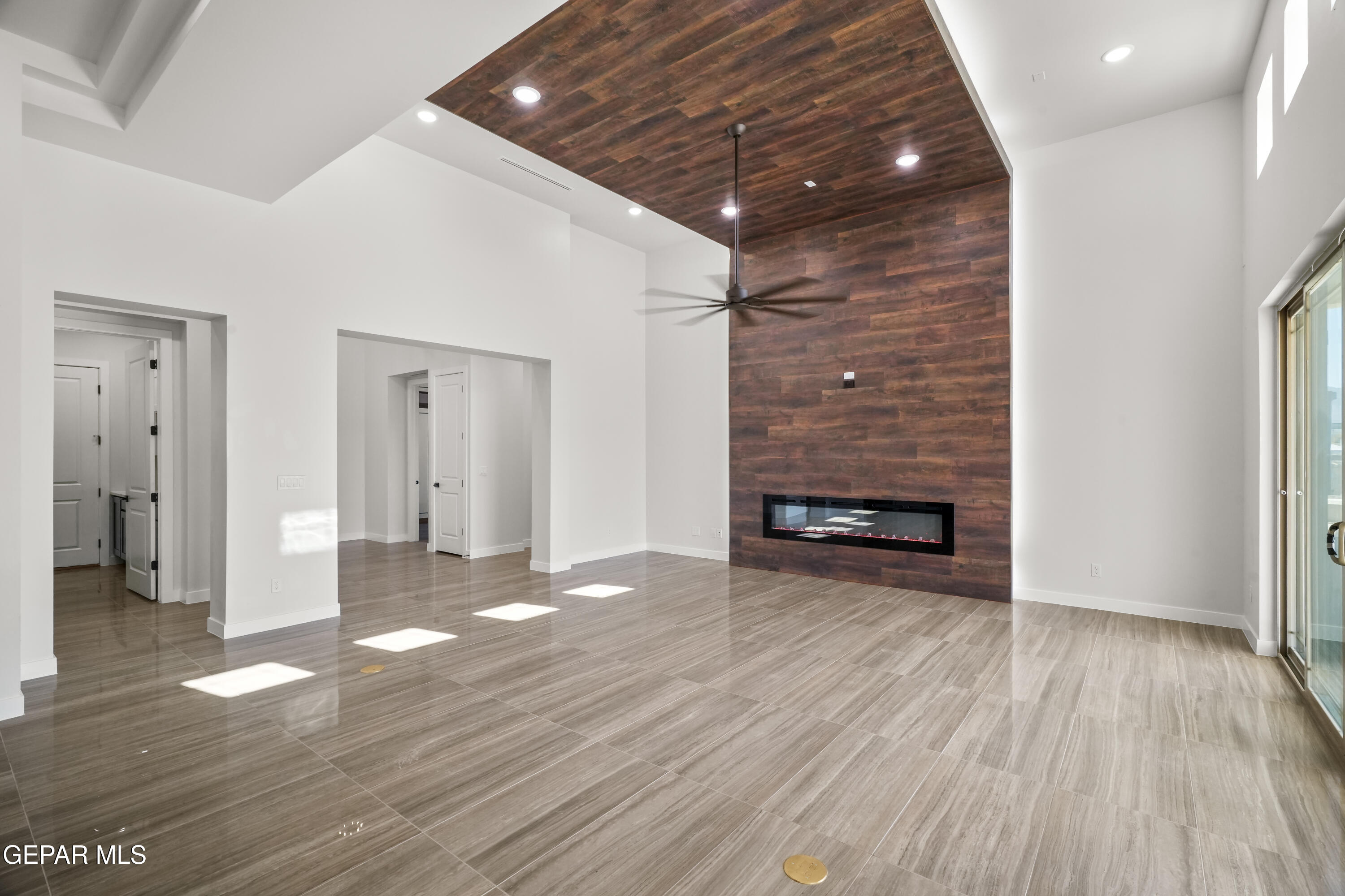 360 Rio De Jazmin Circle El Paso, TX 79932 - Photo 10 of 66 a view of empty room with wooden floor