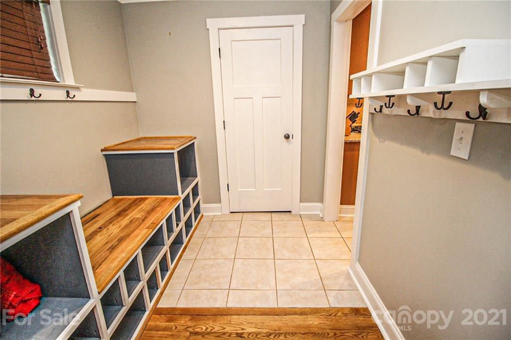 4227 Murrayhill Road Charlotte, NC 28209 - Photo 6 of 24 a view of walk in closet with clothes and shoes