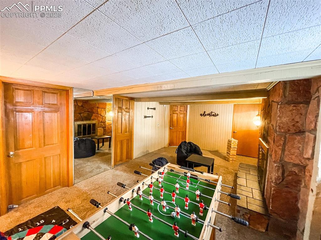 6025 Sioux Trail Cascade, CO 80809 - Photo 23 of 42 a bed room with a bed and a table