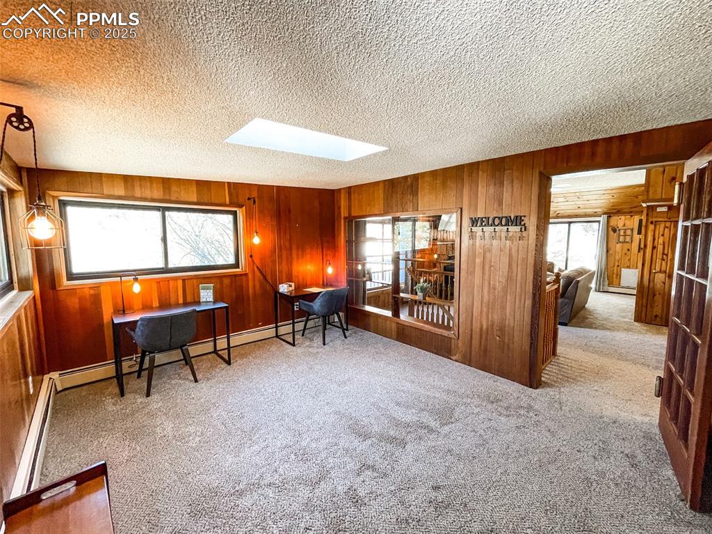 6025 Sioux Trail Cascade, CO 80809 - Photo 7 of 42 a view of a livingroom with furniture and a window