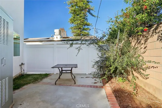 a view of kitchen with wooden floor