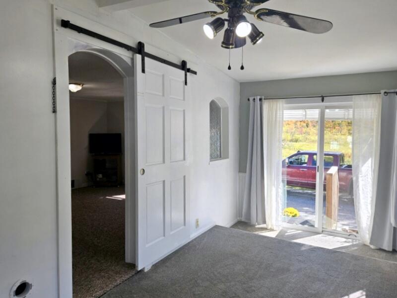 36 Perley Street Lewiston, ME 04240 - Photo 12 of 39 From LR into 4 season sunroom