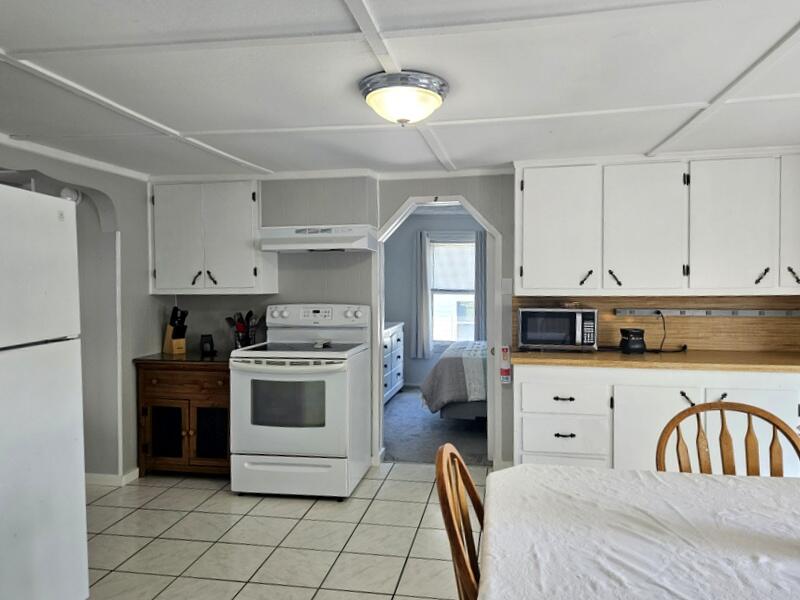 36 Perley Street Lewiston, ME 04240 - Photo 15 of 39 Kitchen overlooking Bedrms