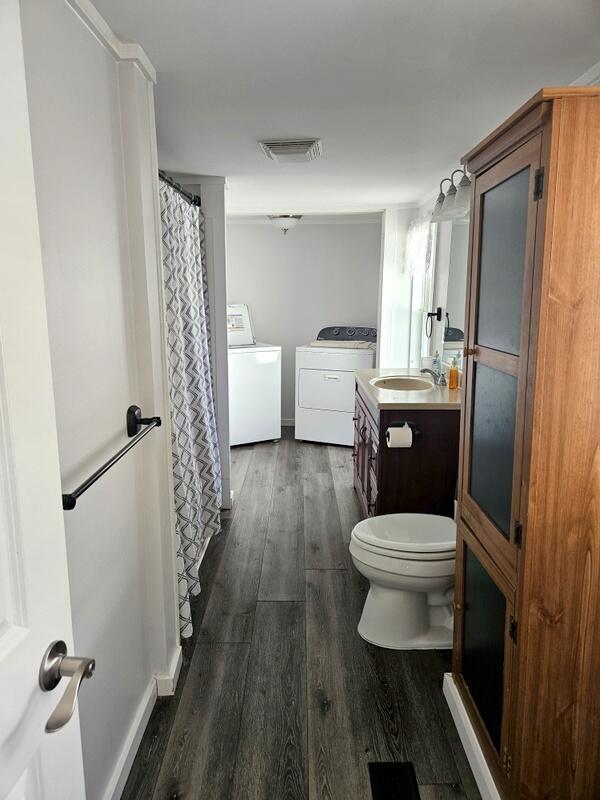 36 Perley Street Lewiston, ME 04240 - Photo 23 of 39 renovated bathrm with laundry