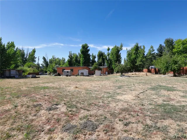 a view of road with a house