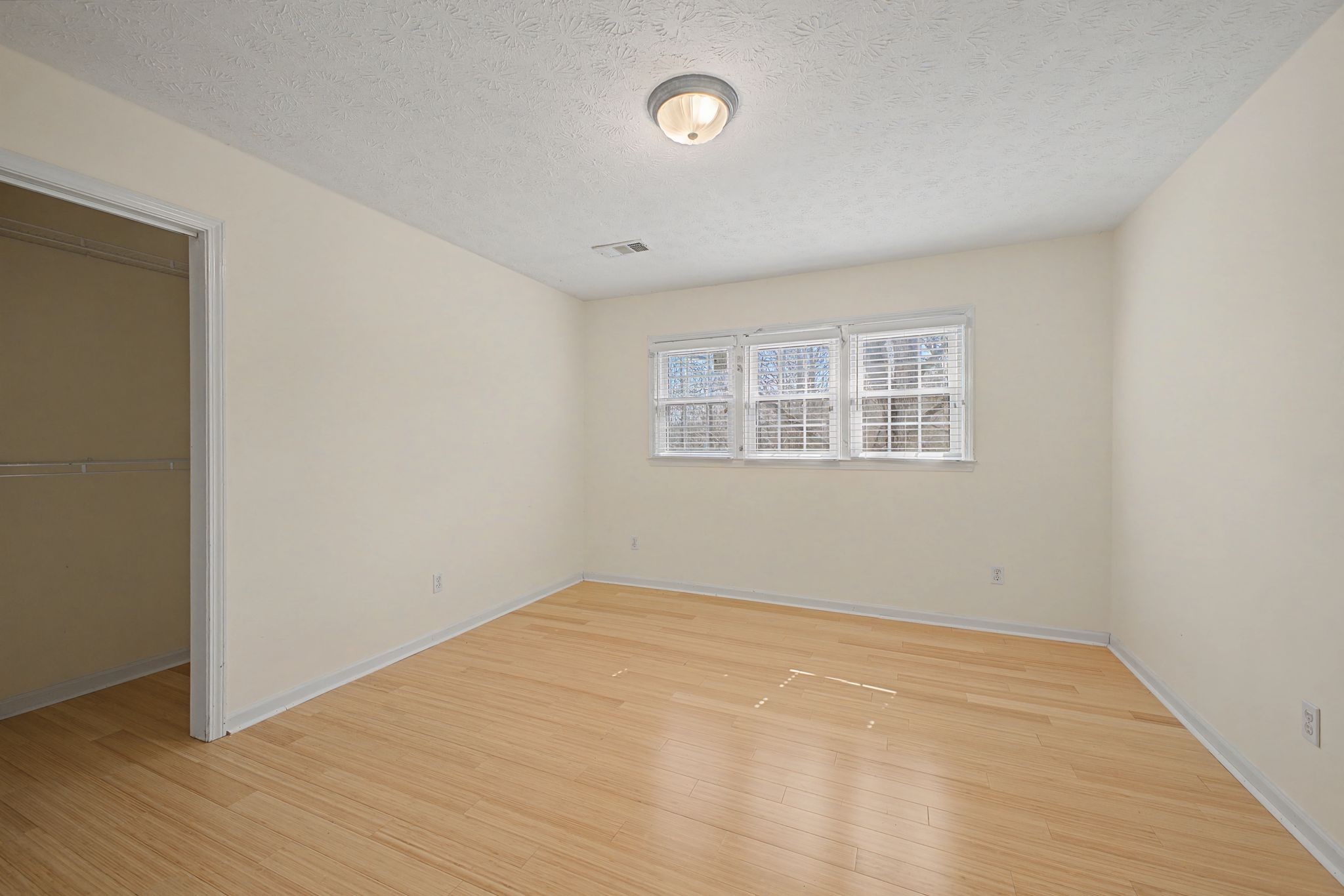 1081 Ridgecrest Drive Kingston Springs, TN 37082 - Photo 23 of 49 wooden floor in an empty room with a window